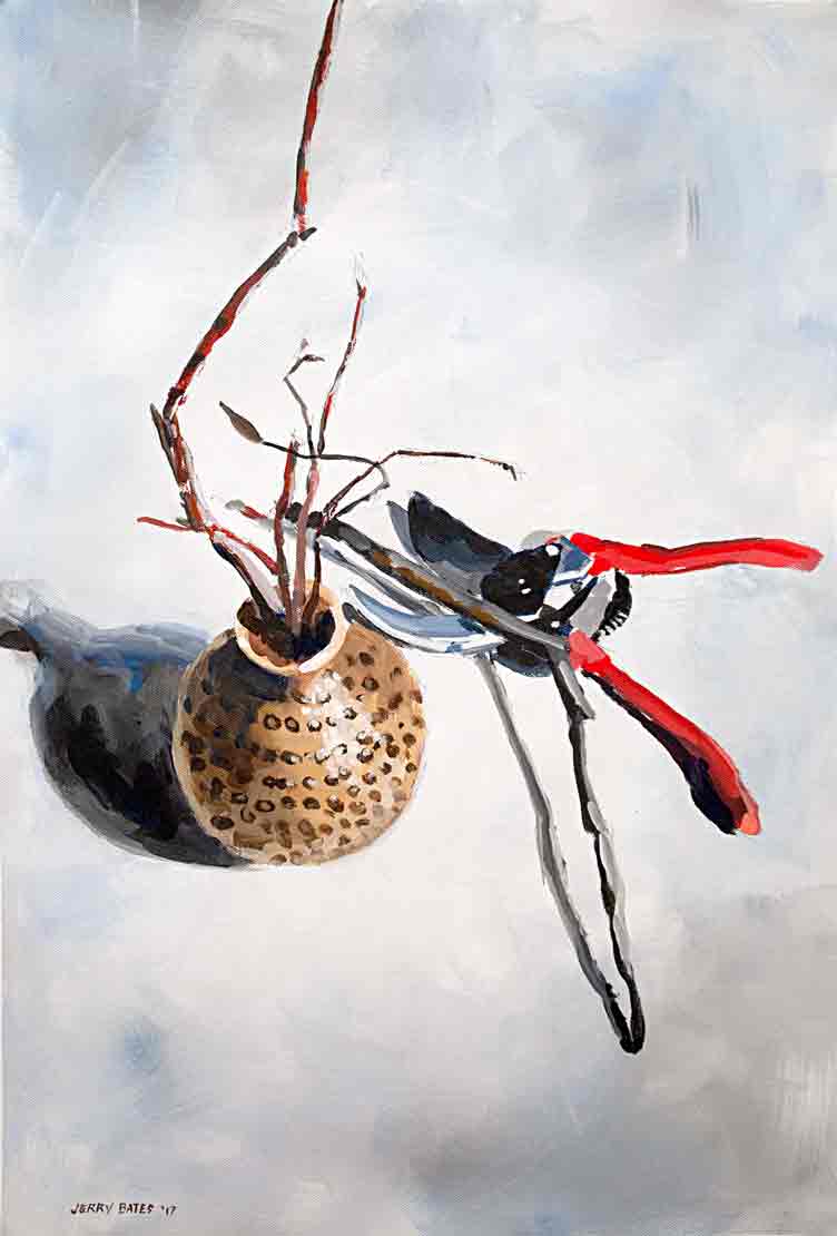 looking down on flower pot hold brances beside pruning shears