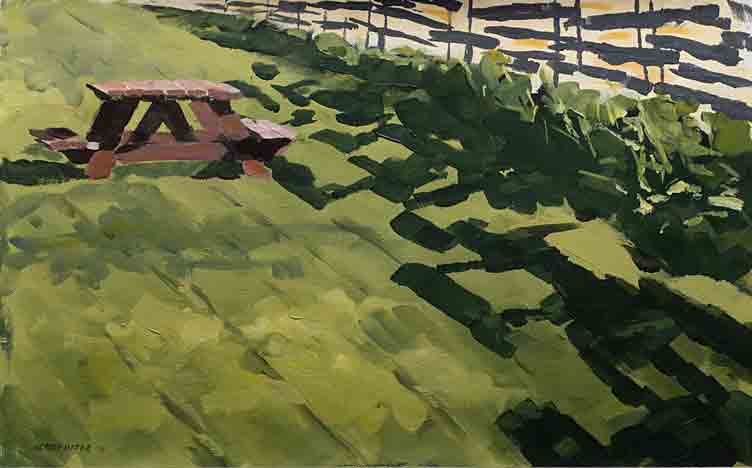 split cedar rail fence line with picnic table